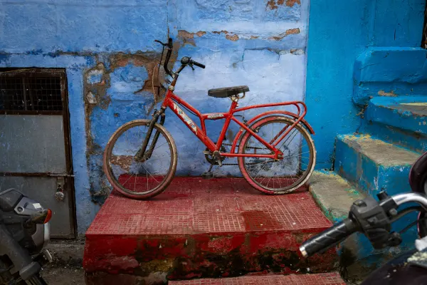 Red bicycle, Blue City, photographed in Jodhpur, India.